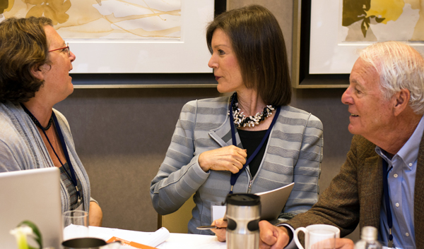 Mary Wildermuth, left, talks with Barbara Bakar, center, and UC Berkeley Foundation Trustee Arnold Silverman