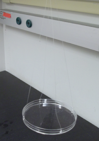 A dust collector used to collect airborne microbes inside public housing units (photo by Rachel Adams)